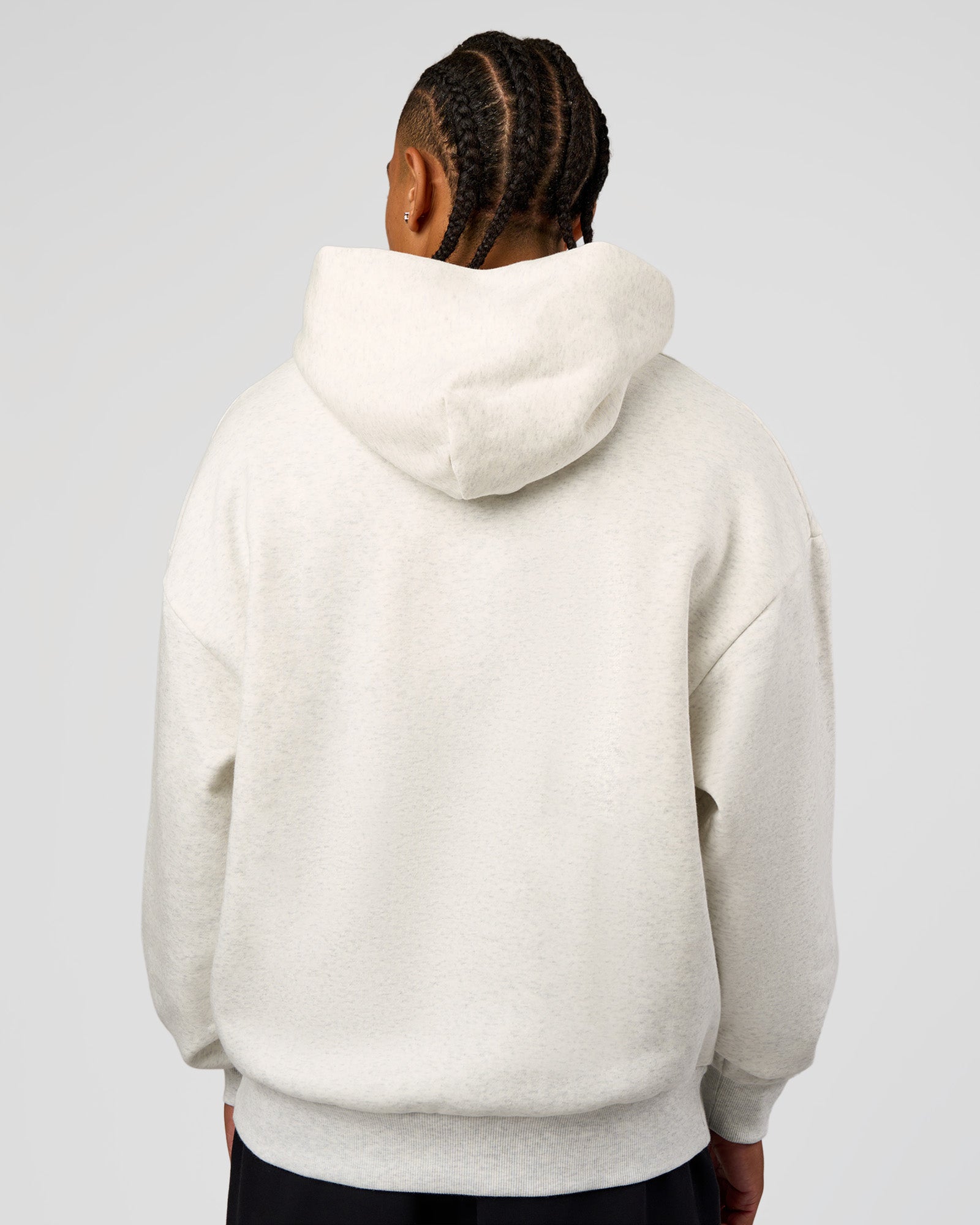 Man wearing Base Oversized Hoodie - Silver Marl | Model:Malebo | Size:M