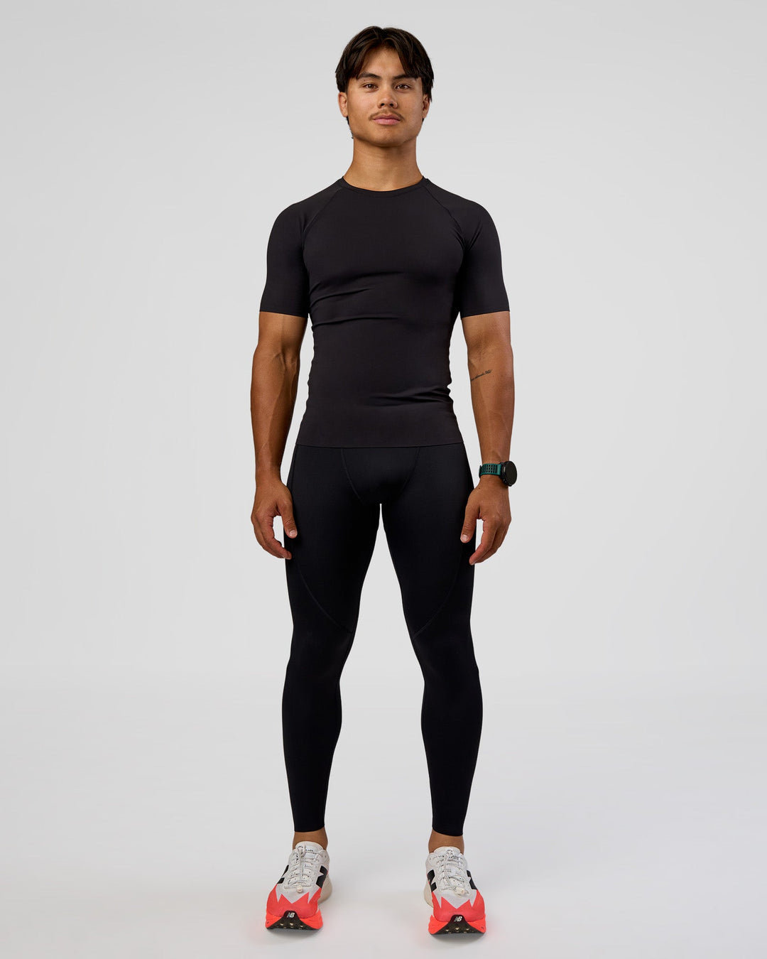 Man wearing BaseTech 26" Leggings - Black | Model:George | Size:M