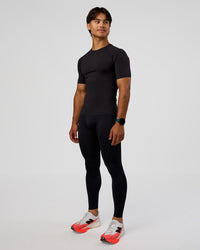 Man wearing BaseTech 26" Leggings - Black | Model:George | Size:M