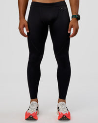 Man wearing BaseTech 26" Leggings - Black | Model:George | Size:M