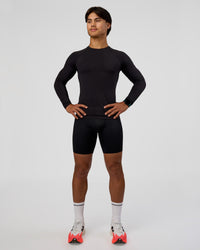Man wearing BaseTech Long Sleeve Tee - Black | Model:George | Size:M