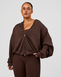 Woman wearing CF Elevate SoftTouch Bomber - Hot Chocolate | Model:Simmy | Size:M