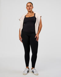 Woman wearing CF Fold Over High-Rise Full Length Legging - Black | Model:Simmy | Size:M