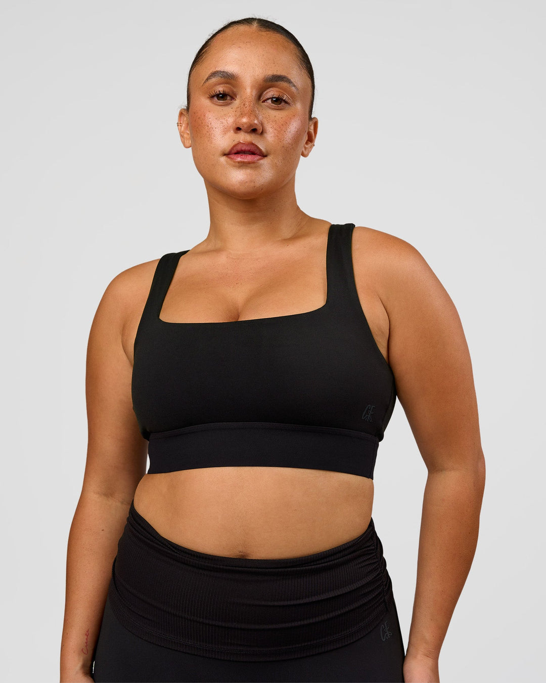 Woman wearing CF Train Hard Sports Bra - Black | Model:Simmy | Size:M