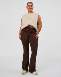 Woman wearing CF Unisex Oversized Heavyweight Boxed Tank - Clay-CF Move Through It | Model:Simmy | Size:M