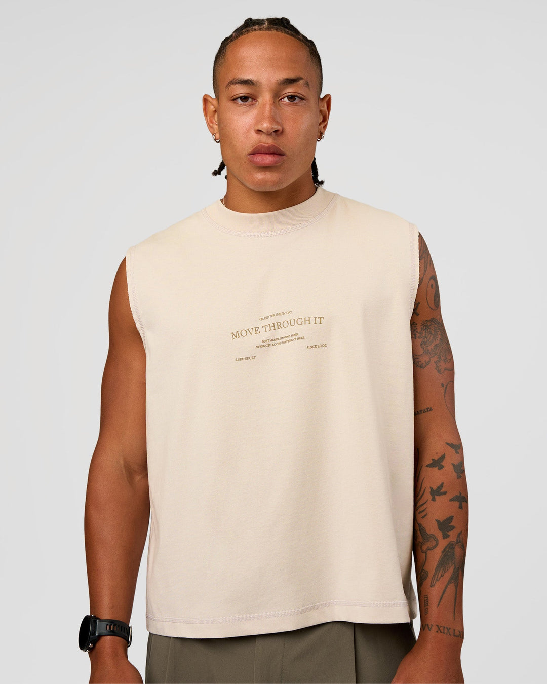 Man wearing CF Unisex Oversized Heavyweight Boxed Tank - Clay-CF Move Through It | Model:Malebo | Size:M