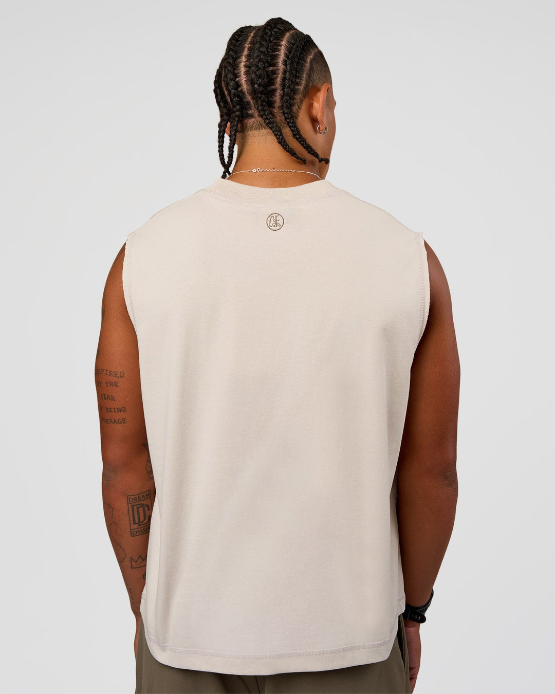 Man wearing CF Unisex Oversized Heavyweight Boxed Tank - Clay-CF Move Through It | Model:Malebo | Size:M