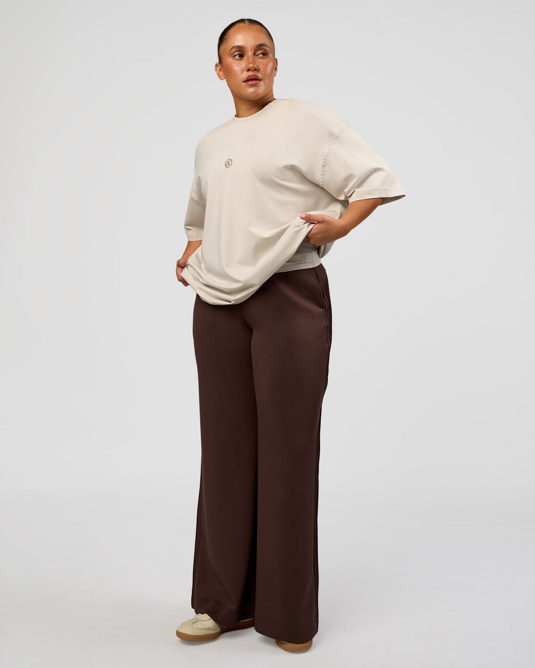 Woman wearing CF Unisex Oversized Heavyweight FLXCotton Tee - Clay-CF X LSKD Sport | Model:Simmy | Size:M