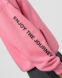 Man wearing CFT BNE 26 Unisex Oversized Hoodie - Candy Pink-Black | Model:Malebo | Size:M