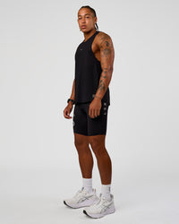 Man wearing Cadence Run Club Script Values Tank - Black-Alloy | Model:Malebo | Size:M