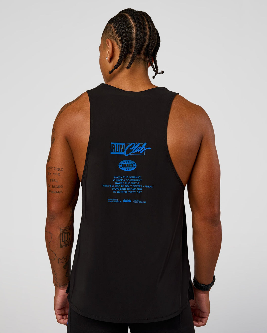 Man wearing Cadence Run Club Script Values Tank - Black-Palace Blue | Model:Malebo | Size:M