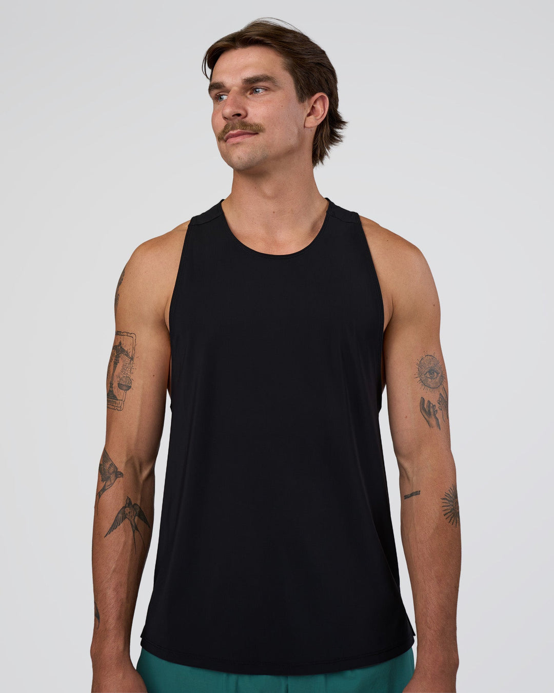 Man wearing Cadence Swift Tank - Black | Model:Konnor | Size:M