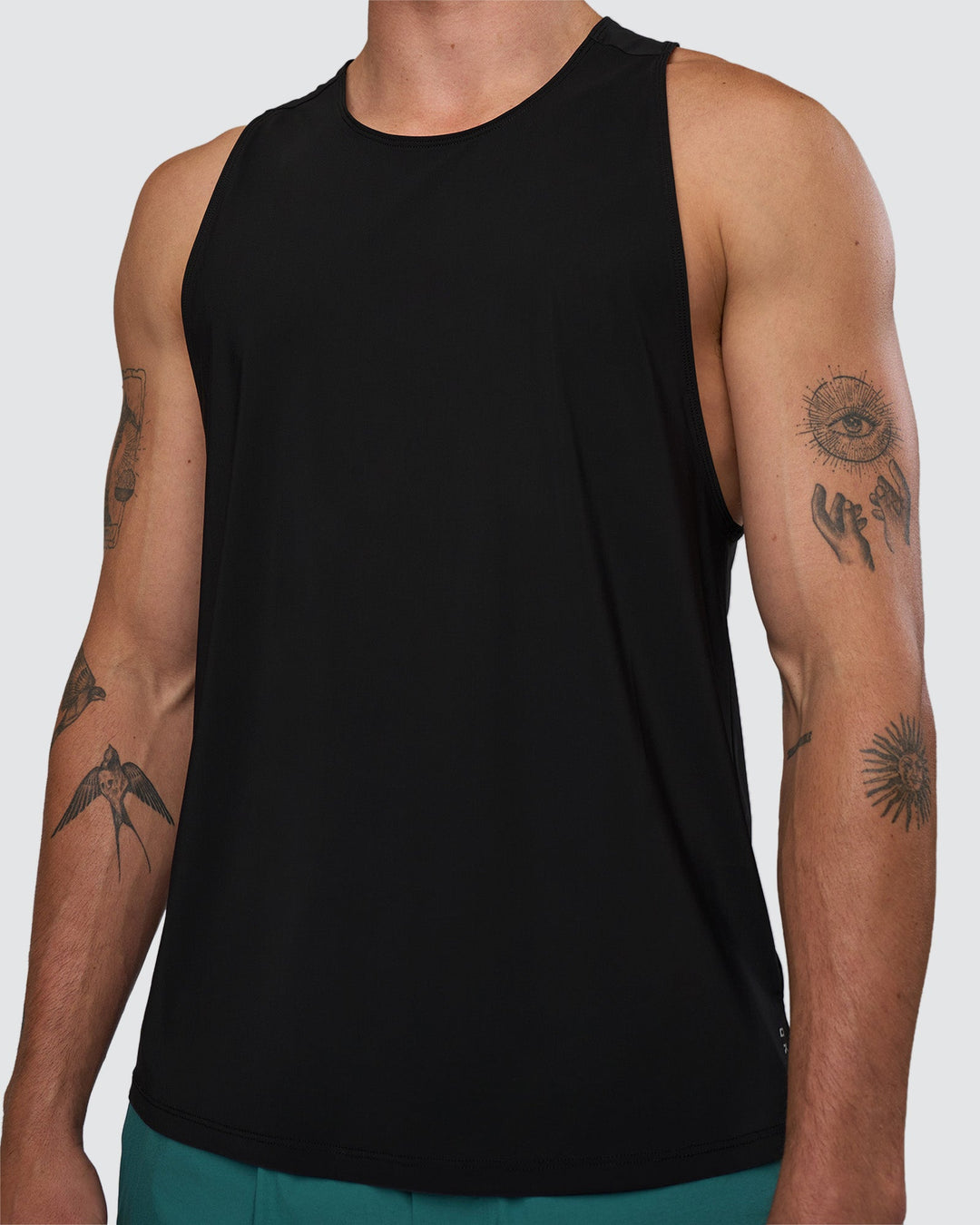 Man wearing Cadence Swift Tank - Black | Model:Konnor | Size:M