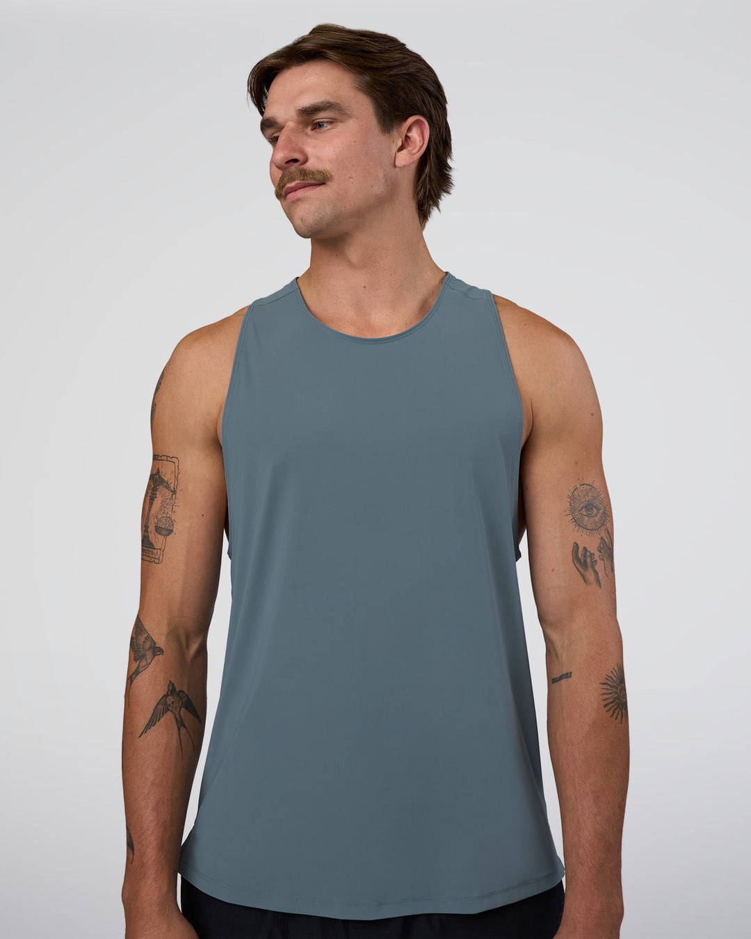 Man wearing Cadence Swift Tank - Blue Mirage | Model:Konnor | Size:M