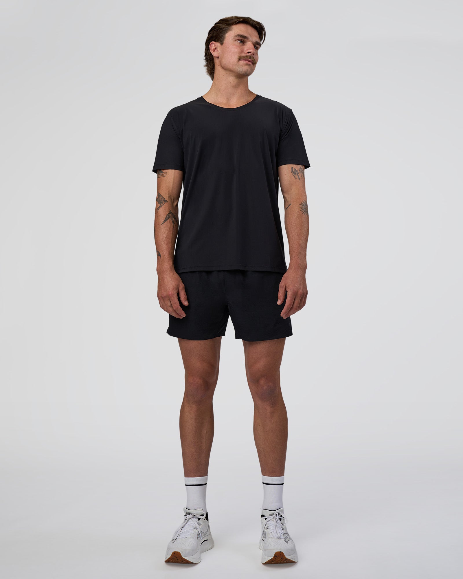 Man wearing Cadence Swift Tee - Black | Model:Konnor | Size:M