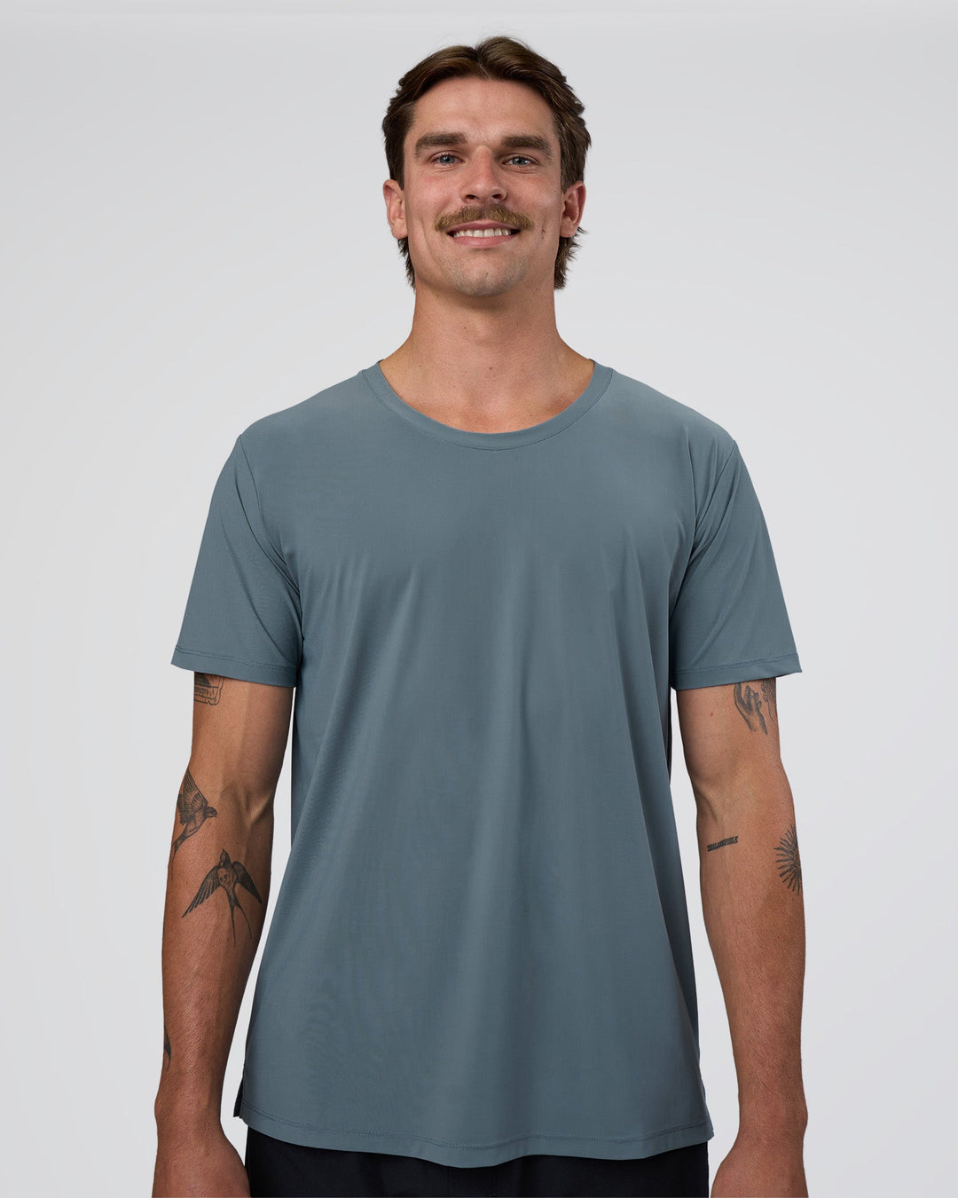 Man wearing Cadence Swift Tee - Blue Mirage | Model:Konnor | Size:M - view 1