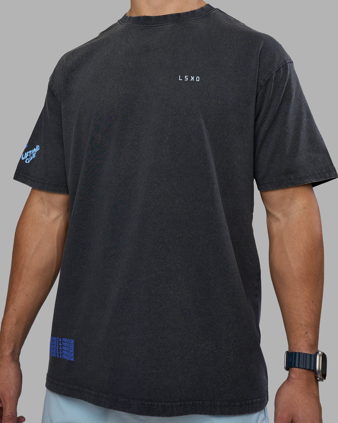 Man wearing Cali FLXCotton Oversized Tee - Black Washed | Model:Jaiden | Size:M