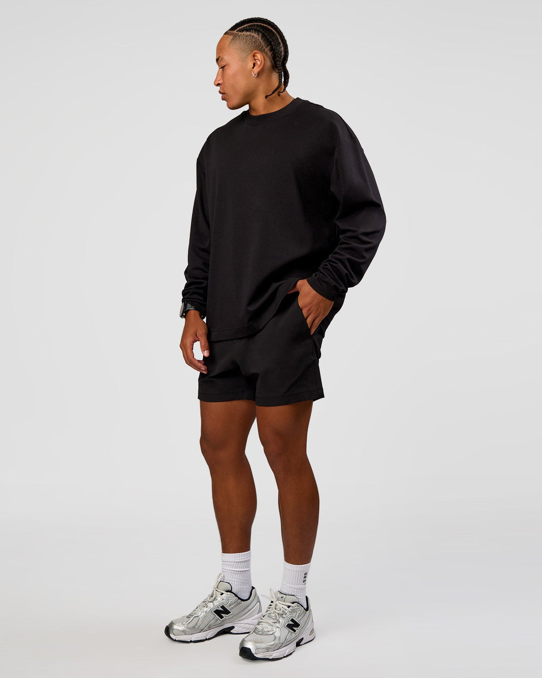 Man wearing Daily 5" Short 2.0 in Black | Model:Malebo | Size:M - view 5