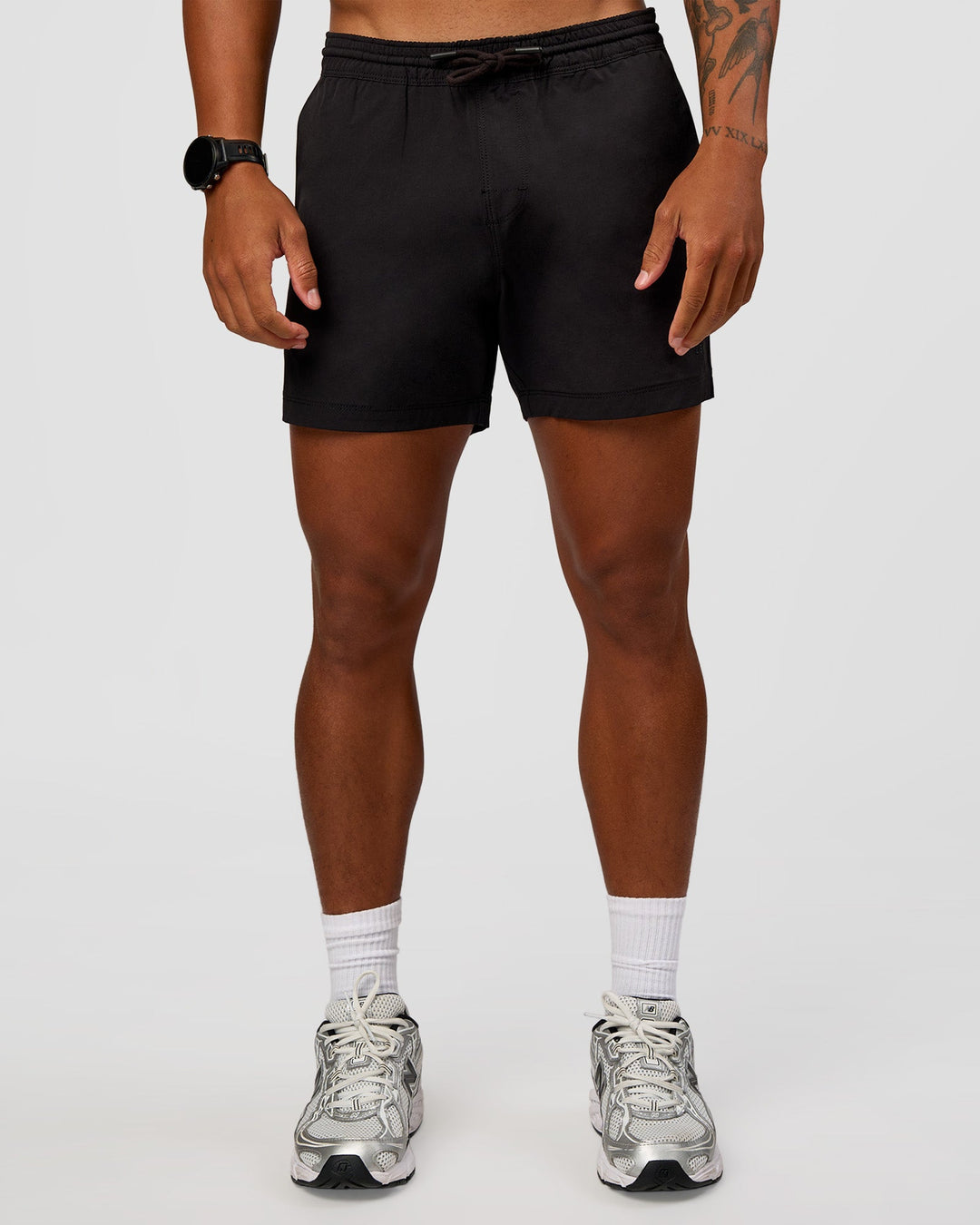 Man wearing Daily 5" Short 2.0 in Black | Model:Malebo | Size:M - view 2