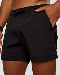 Man wearing Daily 5" Short 2.0 in Black | Model:Malebo | Size:M | Thumbnail Index: 0