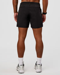 Man wearing Daily 5" Short 2.0 in Black | Model:Malebo | Size:M | Thumbnail Index: 2