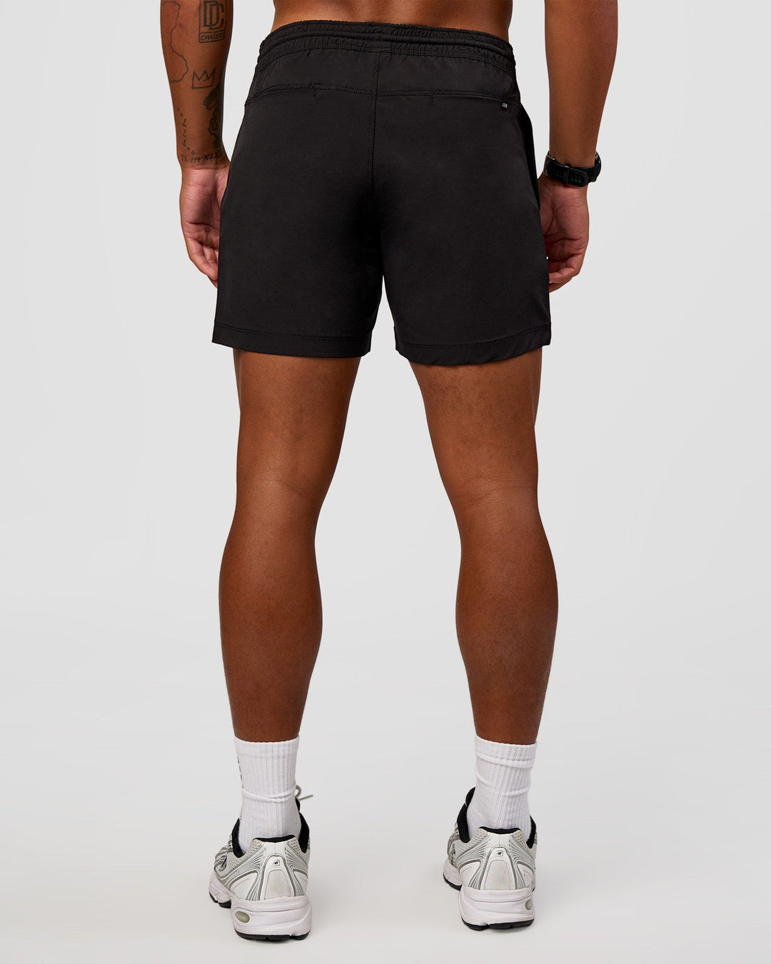 Man wearing Daily 5" Short 2.0 in Black | Model:Malebo | Size:M
