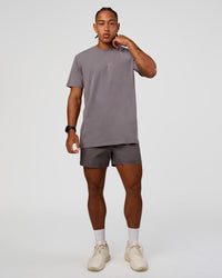 Man wearing Daily 5" Short - Duskstone | Model:Malebo | Size:M