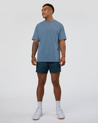 Man wearing Daily 5" Short - Night Sea | Model:Daarian | Size:M