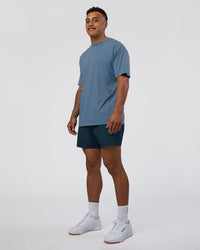 Man wearing Daily 5" Short - Night Sea | Model:Daarian | Size:M