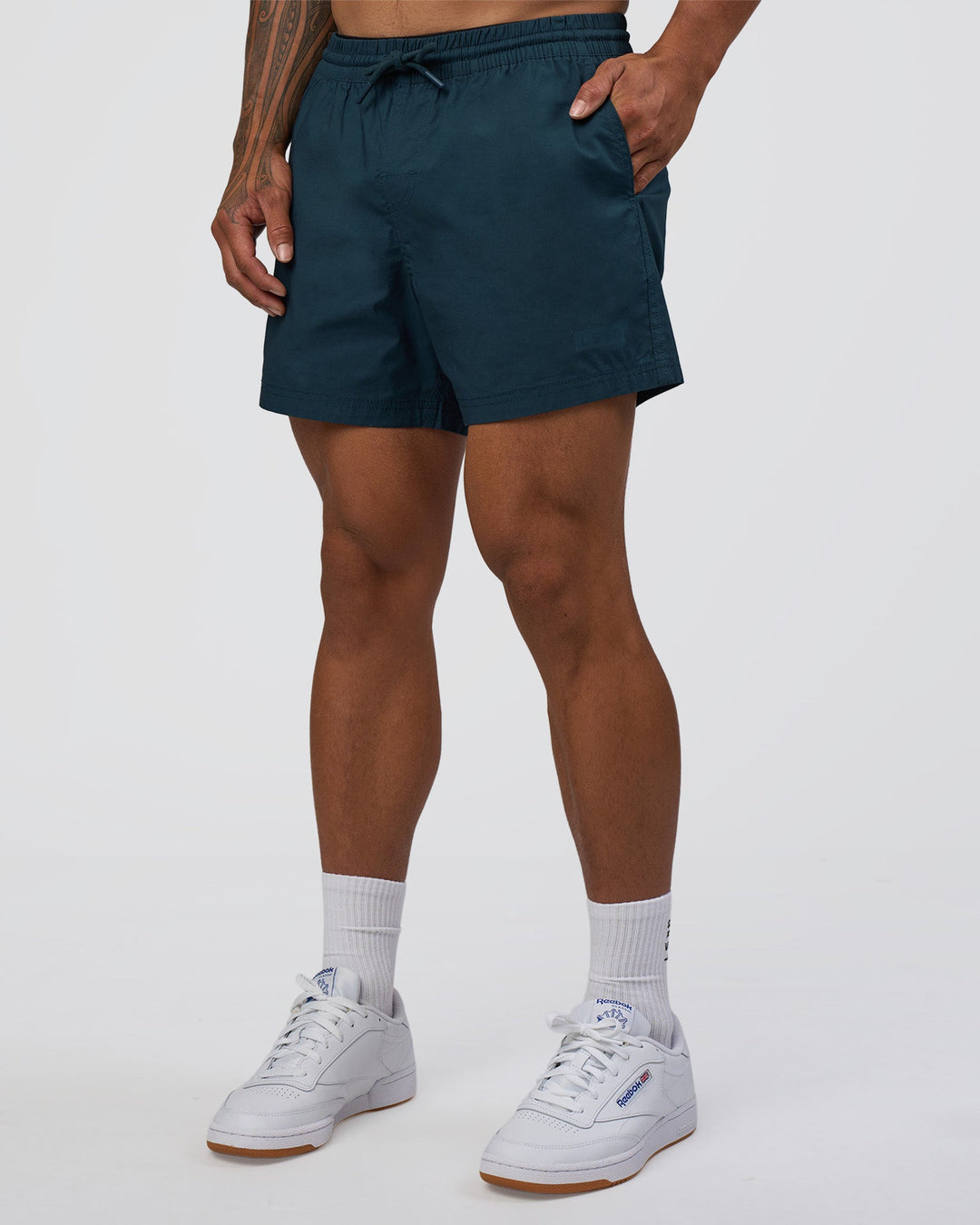 Man wearing Daily 5" Short - Night Sea | Model:Daarian | Size:M