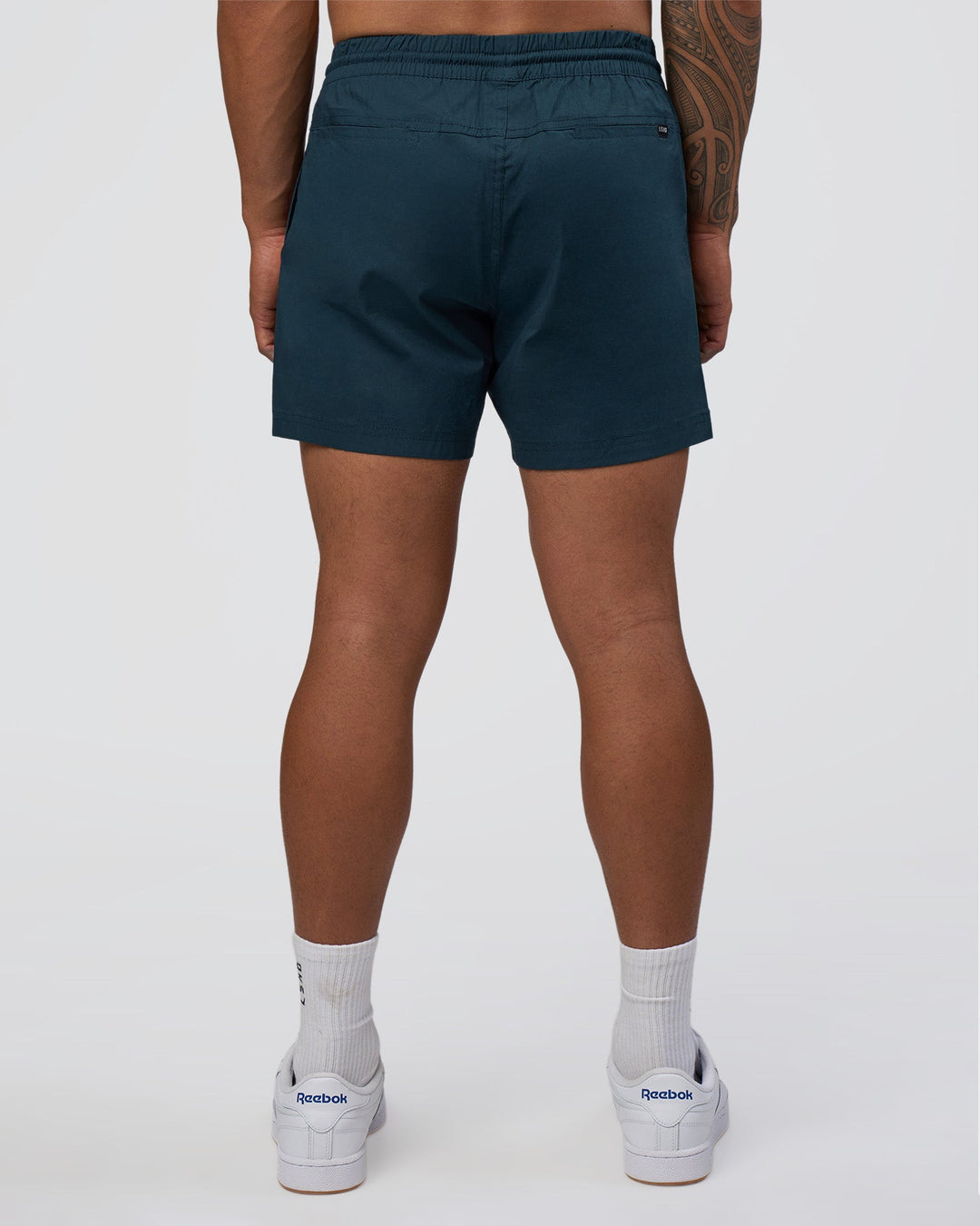 Man wearing Daily 5" Short - Night Sea | Model:Daarian | Size:M