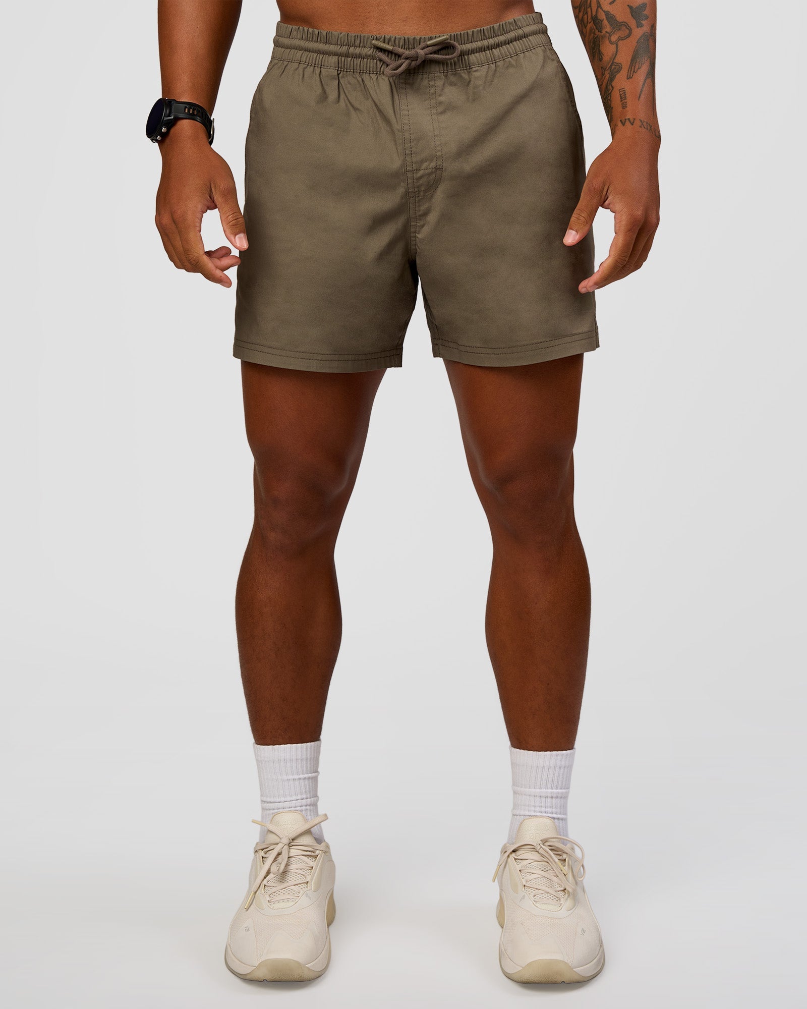 Man wearing Daily 5" Short - Walnut Grey | Model:Malebo | Size:M