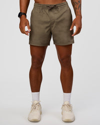 Man wearing Daily 5" Short - Walnut Grey | Model:Malebo | Size:M