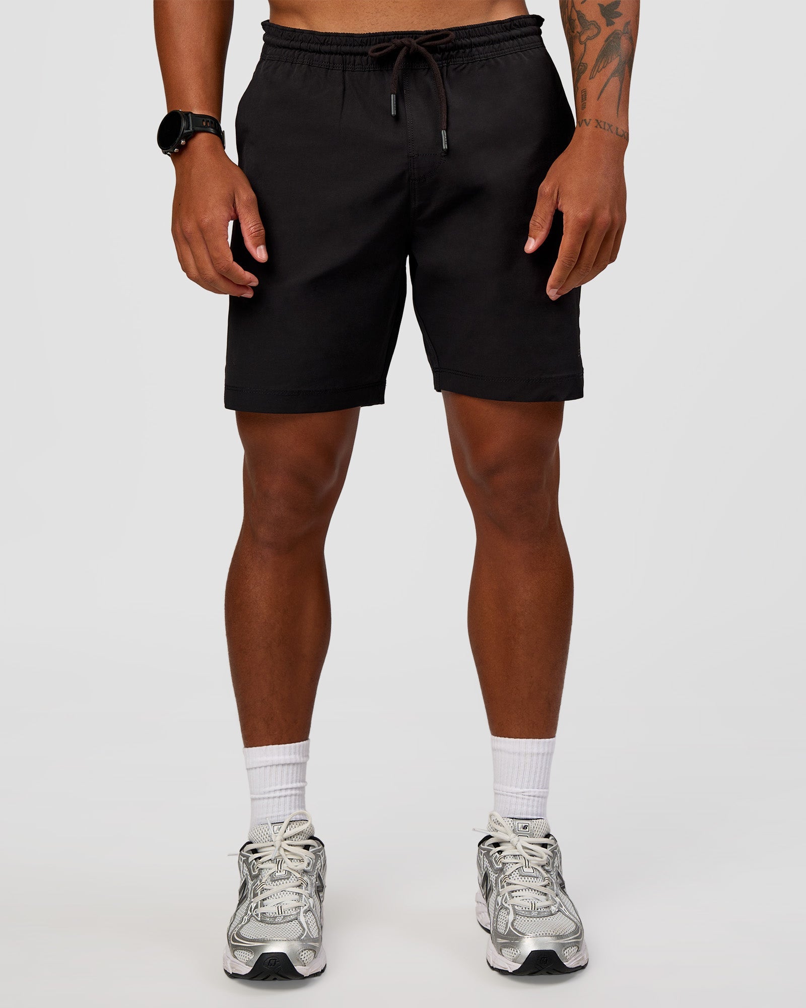 Man wearing Daily 7" Short 2.0 in  Black | Model:Malebo | Size:M