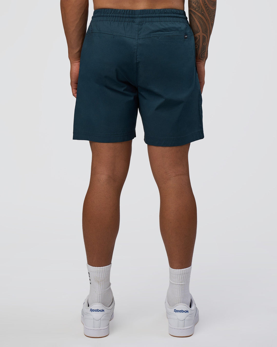 Man wearing Daily 7" Short - Night Sea | Model:Daarian | Size:M