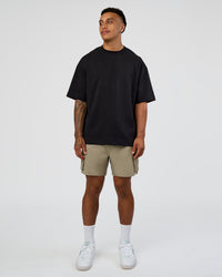 Man wearing Energy Stretch 6" Performance Cargo Short - Laurel Oak | Model:Daarian | Size:M
