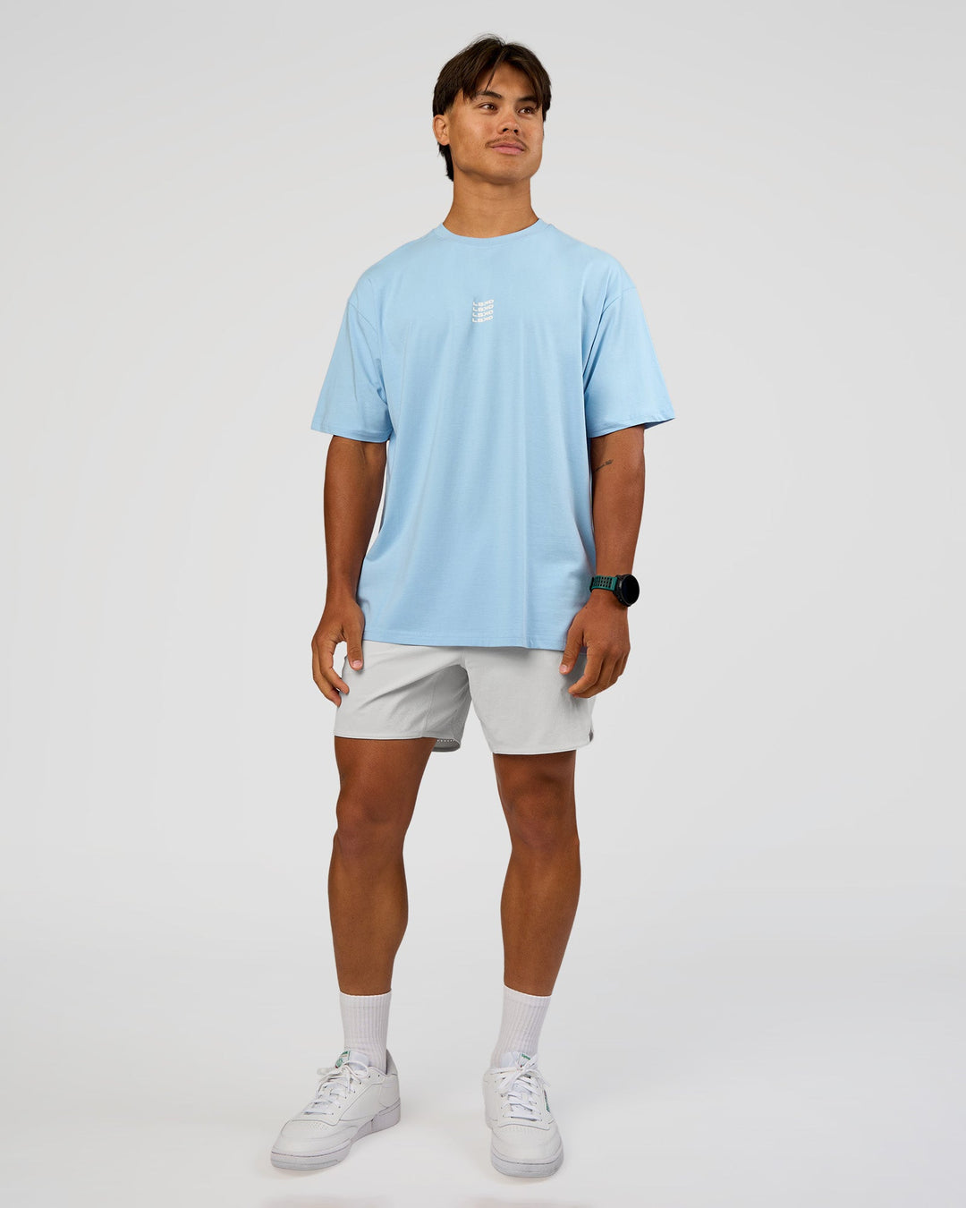 Man wearing Everyday Elevation FLXCotton Oversized Tee - Open Air-Off White | Model:George | Size:M