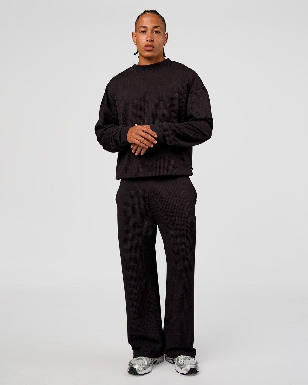 Man wearing Everyday Elevation Waffle Oversized Sweater - Black | Model:Malebo | Size:M