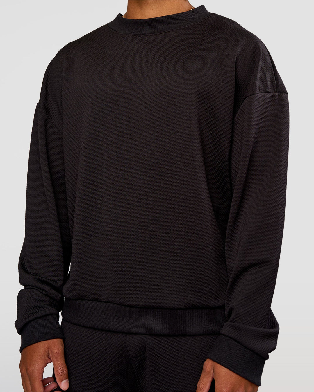 Man wearing Everyday Elevation Waffle Oversized Sweater - Black | Model:Malebo | Size:M