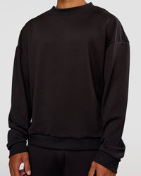 Man wearing Everyday Elevation Waffle Oversized Sweater - Black | Model:Malebo | Size:M