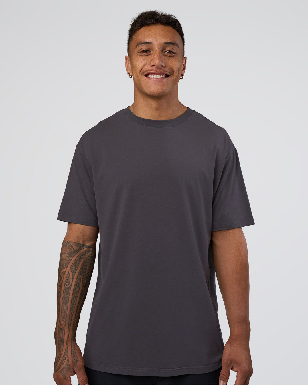 Man wearing Forever EffortlessTech Tee - Dark Storm | Model:Daarian | Size:M