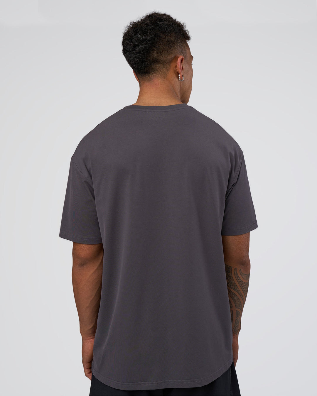 Man wearing Forever EffortlessTech Tee - Dark Storm | Model:Daarian | Size:M