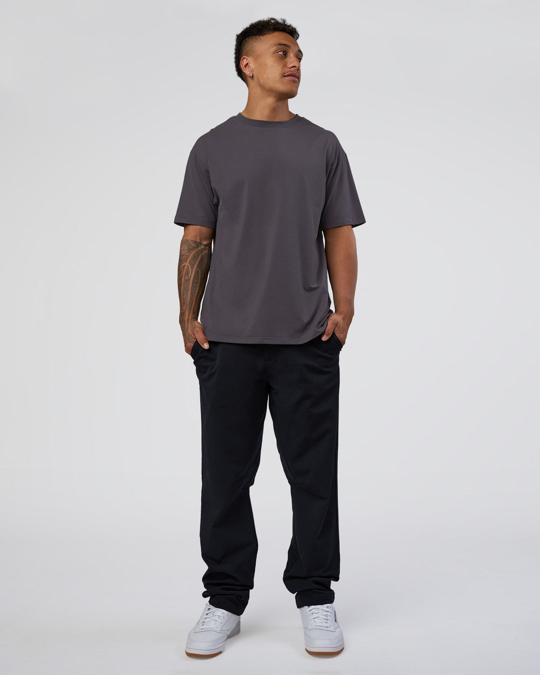 Man wearing Forever EffortlessTech Tee - Dark Storm | Model:Daarian | Size:M