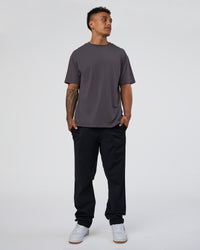 Man wearing Forever EffortlessTech Tee - Dark Storm | Model:Daarian | Size:M