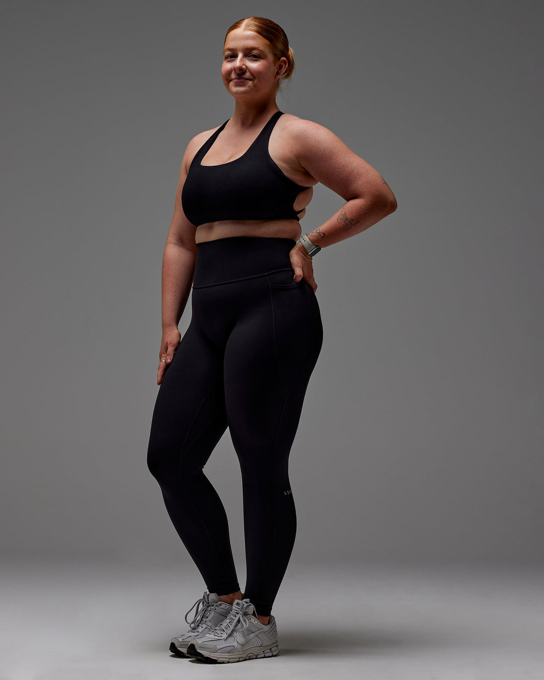Woman wearing Fusion Ultra High-Rise Full Length Legging Pockets - Black | Model:Caity | Size:M