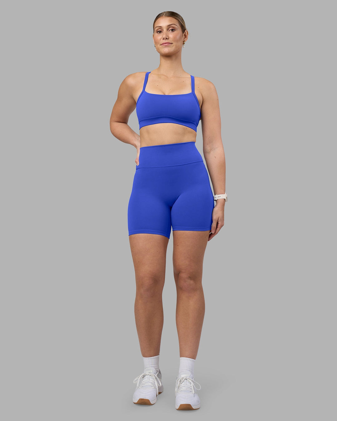 Woman wearing Fusion Ultra High-Rise 6&quot; Short - Power Cobalt | Model:Amy | Size:M