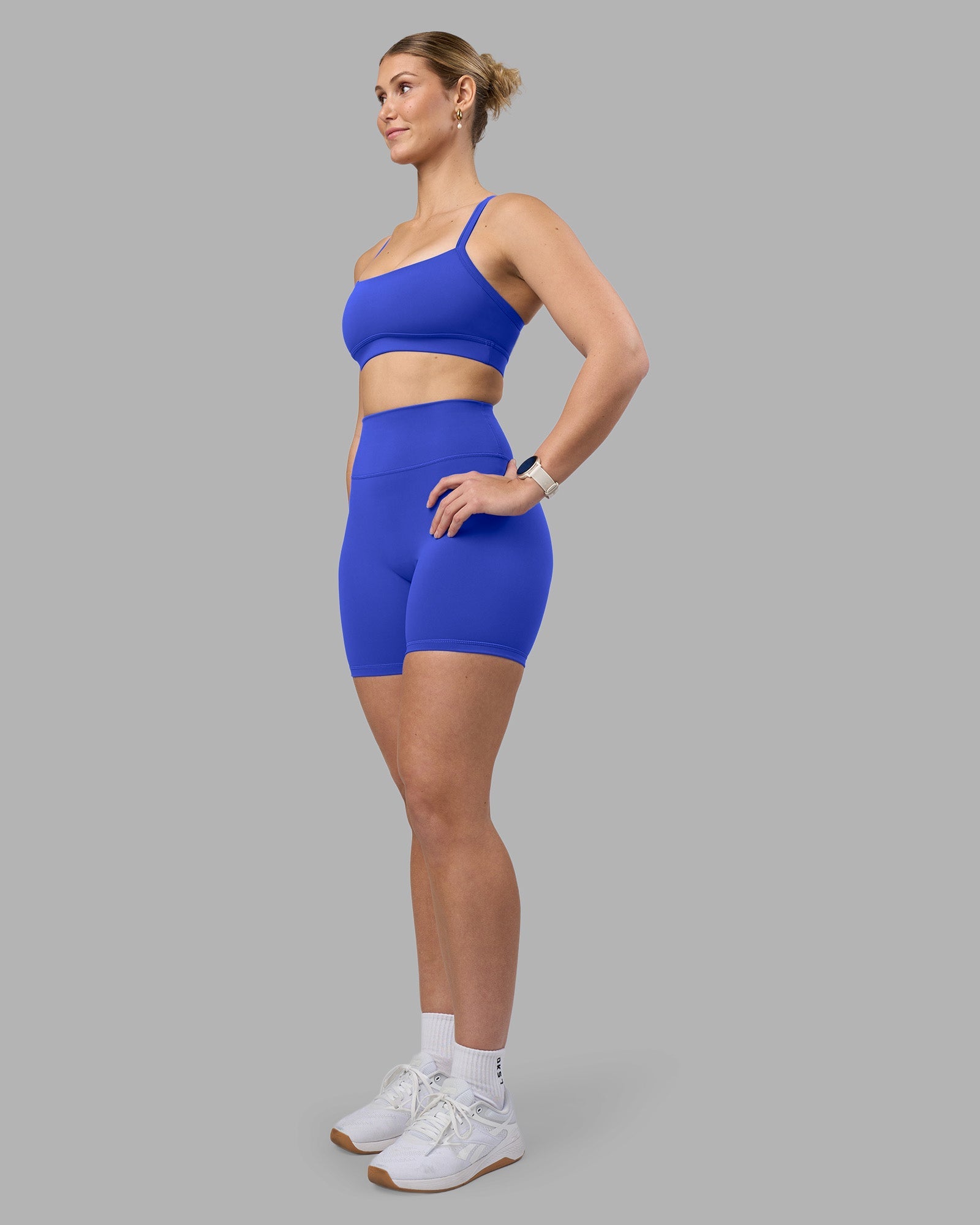 Woman wearing Fusion Ultra High-Rise 6" Short - Power Cobalt | Model:Amy | Size:M