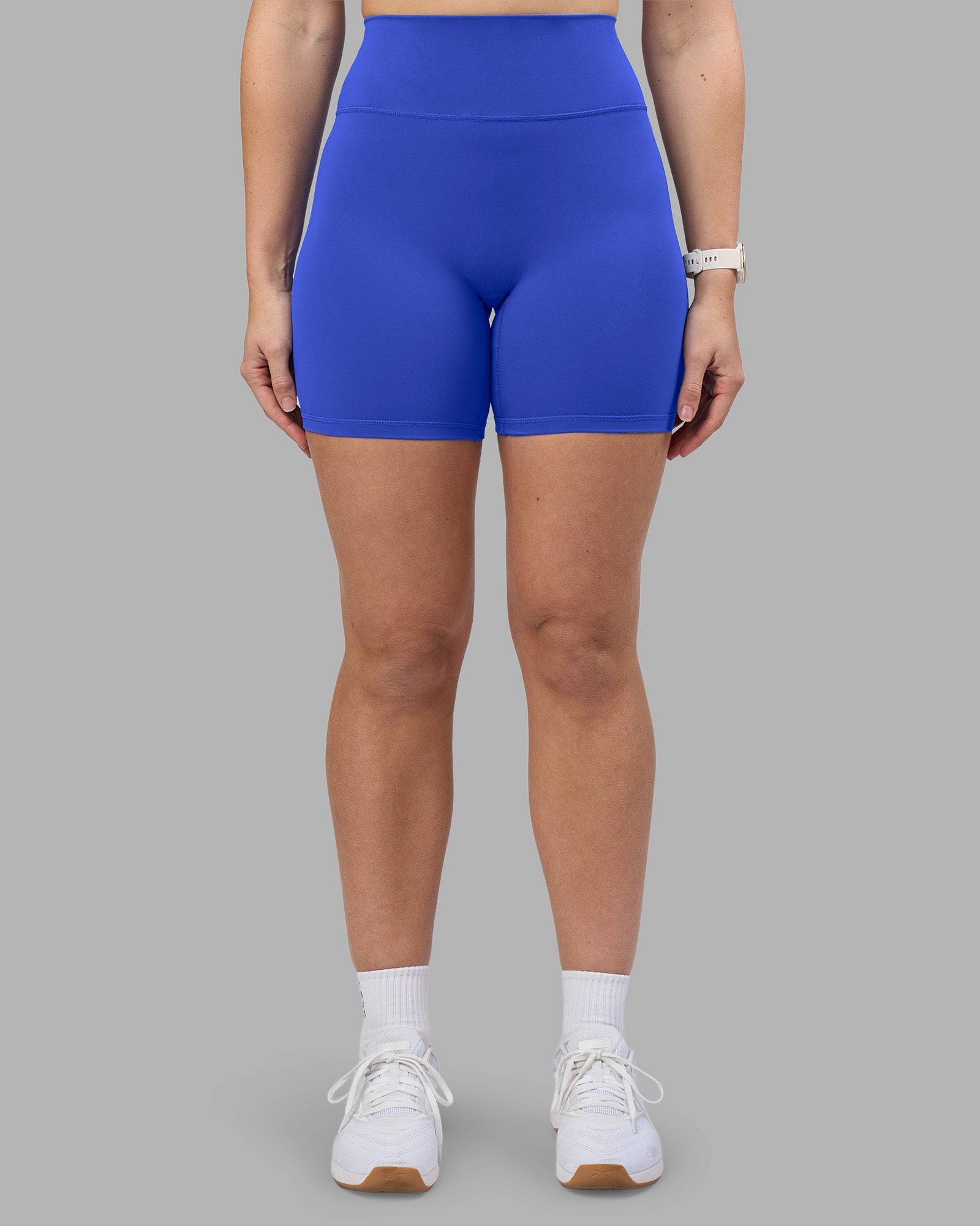 Woman wearing Fusion Ultra High-Rise 6" Short - Power Cobalt | Model:Amy | Size:M