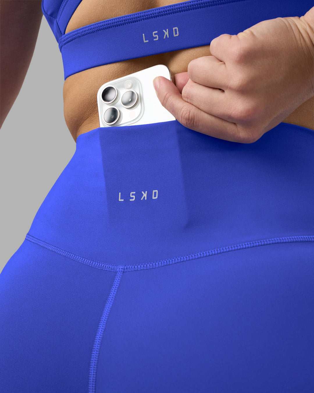 Woman wearing Fusion Ultra High-Rise 6&quot; Short - Power Cobalt | Model:Amy | Size:M