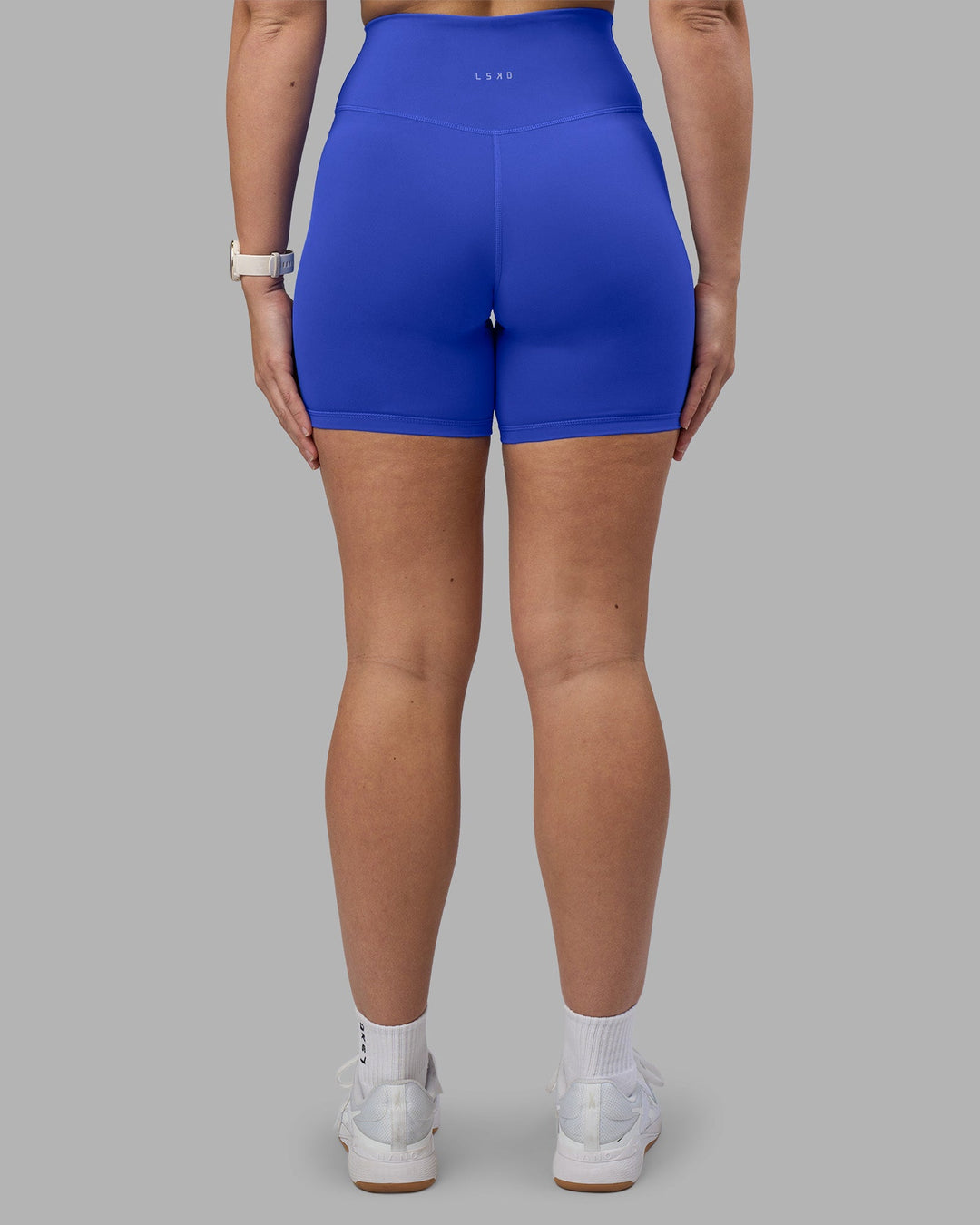Woman wearing Fusion Ultra High-Rise 6&quot; Short - Power Cobalt | Model:Amy | Size:M